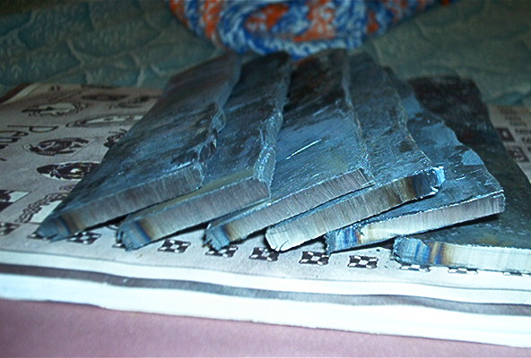 Six billets forge welded with 25 layers each