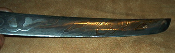 An art piece Tanto made with nine different metals with lots of 200 N Nickel